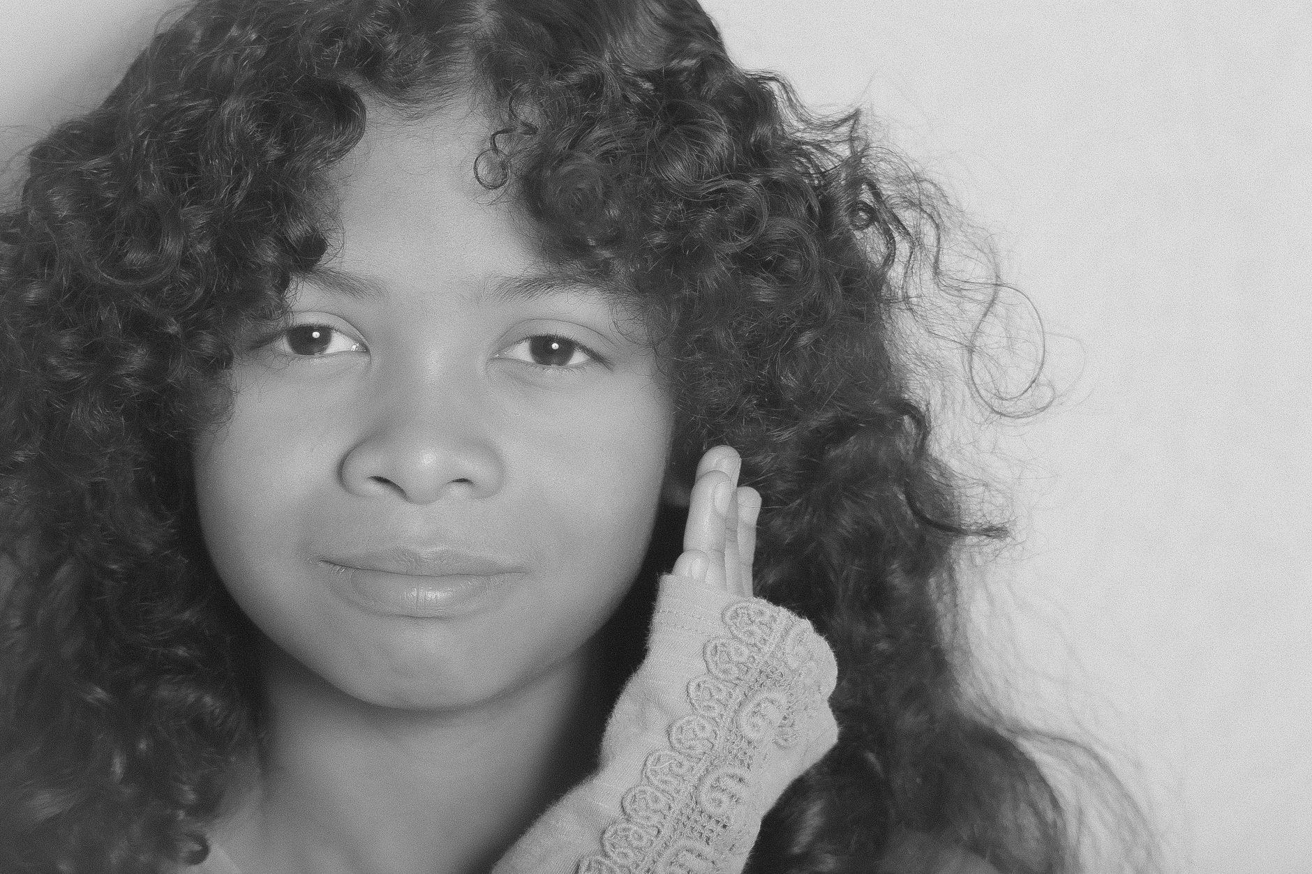 Black and white portrait of long flowing hair