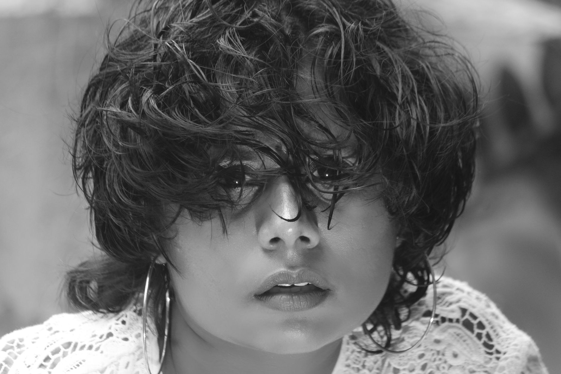 Black and white portrait of textured curly hair